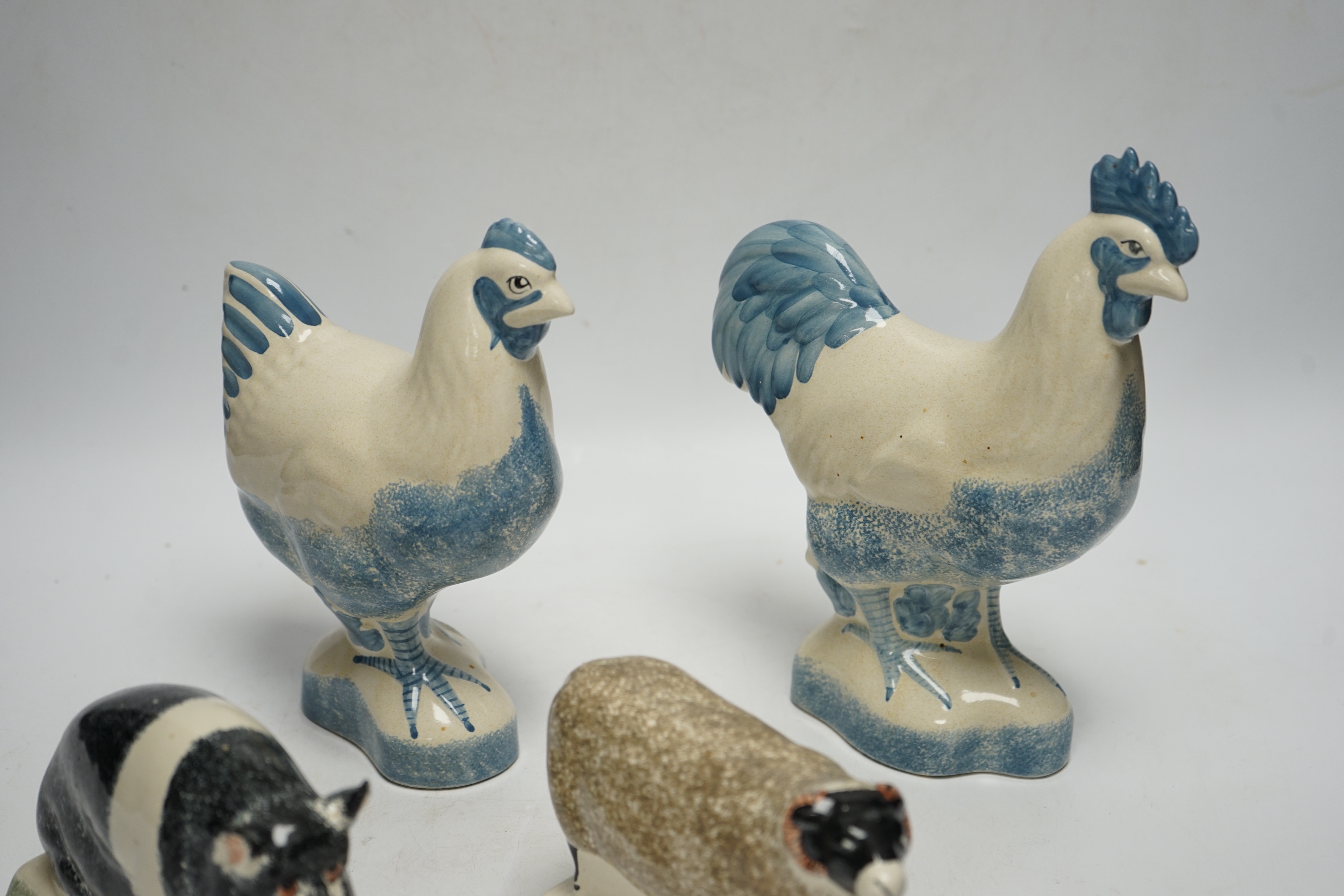 Four pieces of Rye Pottery to include a sow, ram, chicken and cockerel, 22cm